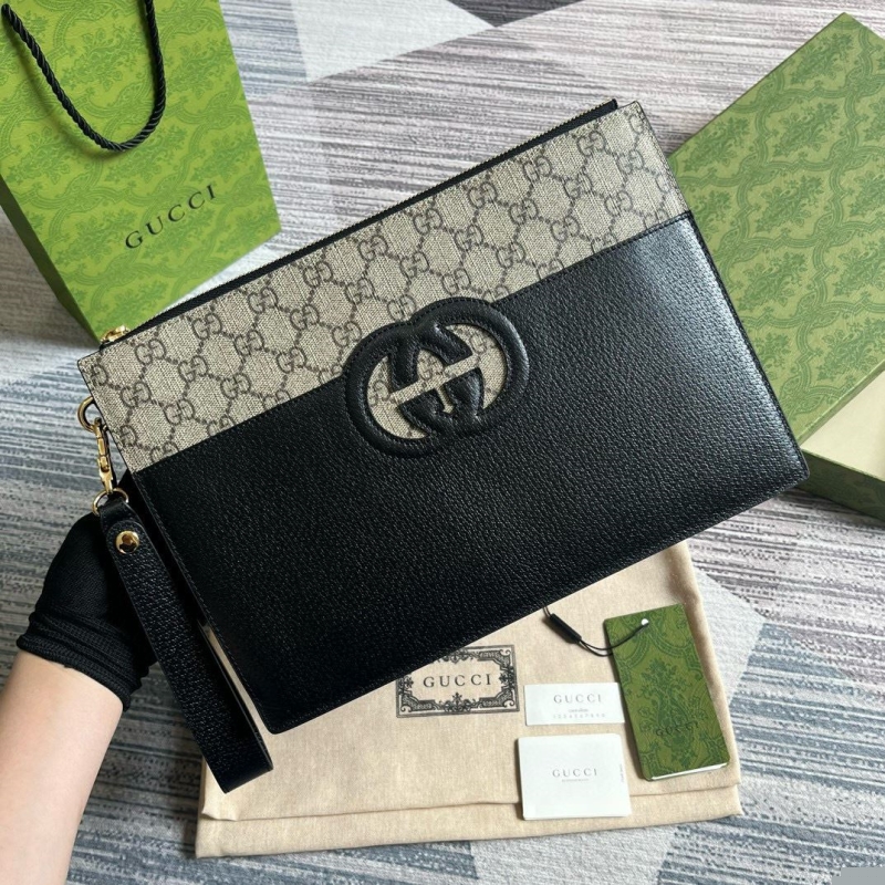 G*u*i clutch bags